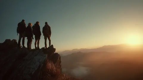 Hikers on mountain summit